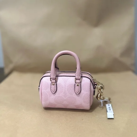 🌸🌸🎀 Coach Mini Rowan Bag Charm In Signature Canvas NEW POWDER PINK COLLECTION - Picture 2 of 2